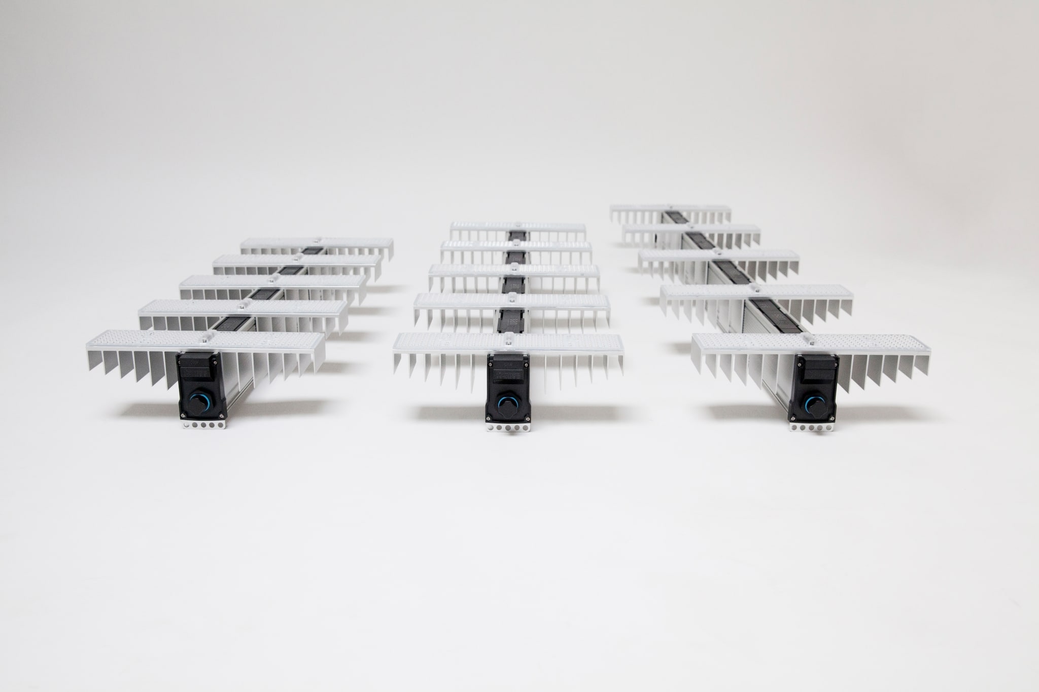 EVO luminaires laying in a row
